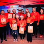 3.- Ignacio Glass y Sulin Lantigua de Glass junto a empleados directores de departamentos.